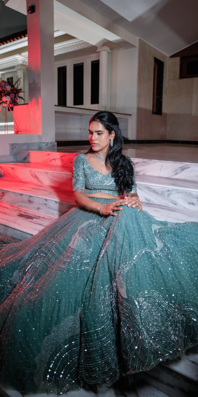 Wide portrait of the bride in her wedding attire, beautifully framed with the surroundings.