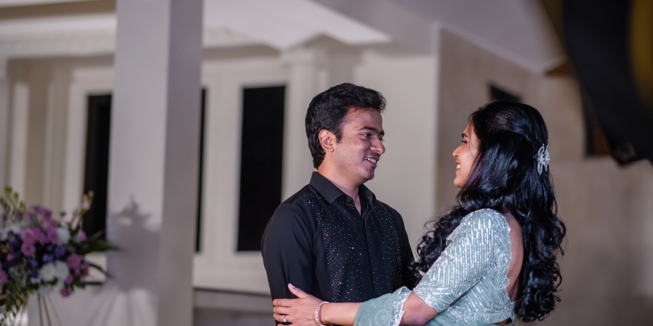Couple gazing deeply into each other’s eyes, sharing a quiet, loving moment.