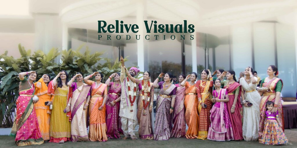 Bride and groom performing the Arundhati Nakshatram ritual, guided by family members, as they look toward the sacred star in the sky.